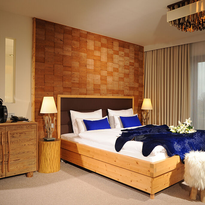Themenzimmer AlpenArt Bett